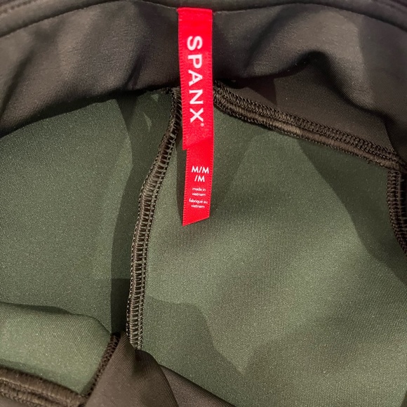 Olive green suede leggings. Wore once.They are a tight medium with some stretch. - Picture 2 of 5